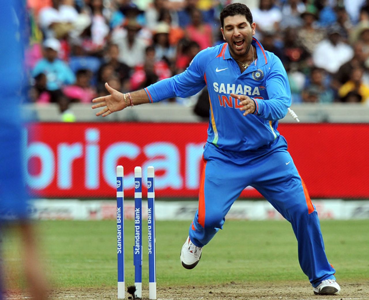 Yuvraj Singh celebrates the run-out of AB de Villiers, South Africa v India, only Twenty20, Durban