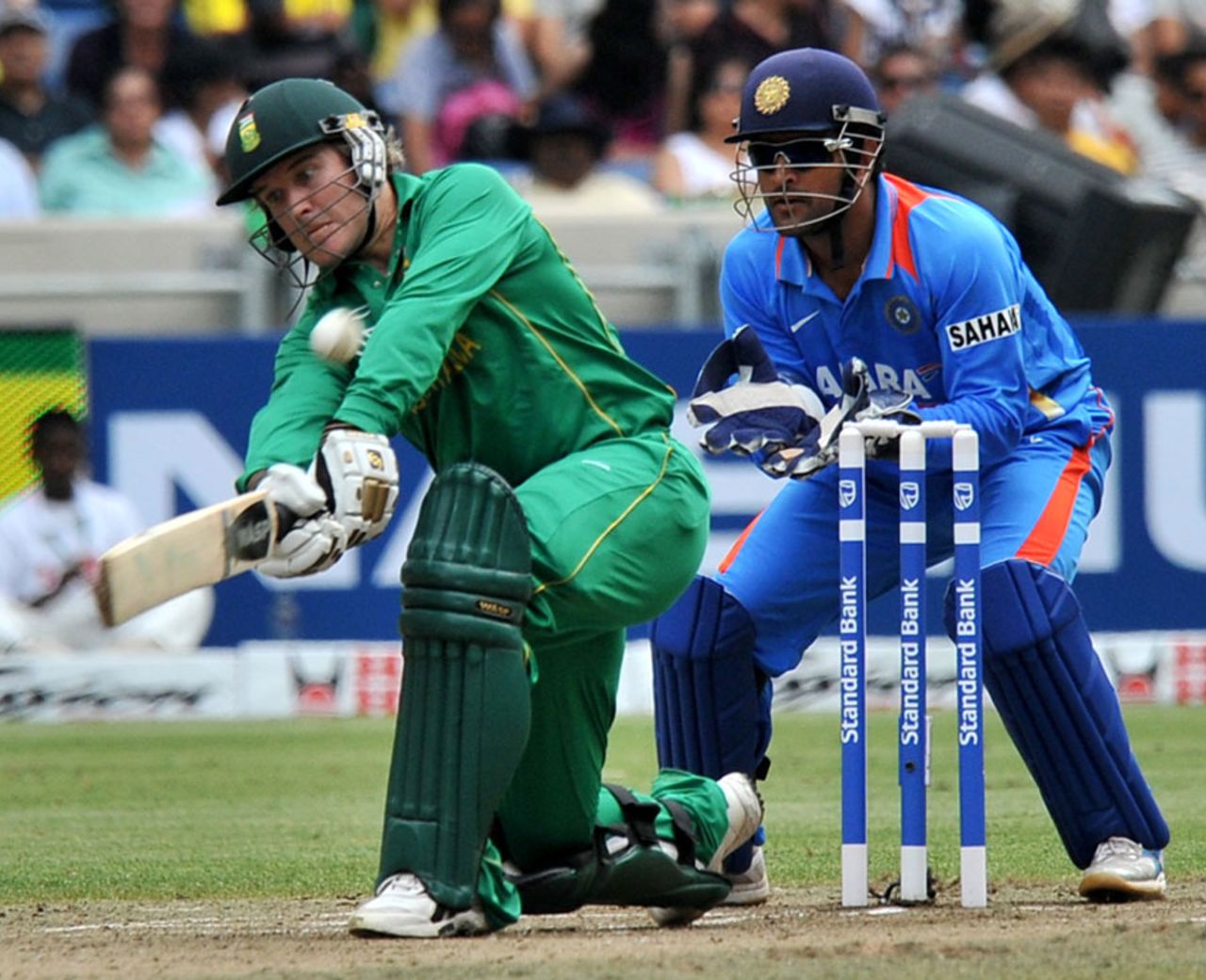 Morne van Wyk plays a slog sweep during his 67 off 39 balls, South Africa v India, only Twenty20, Durban