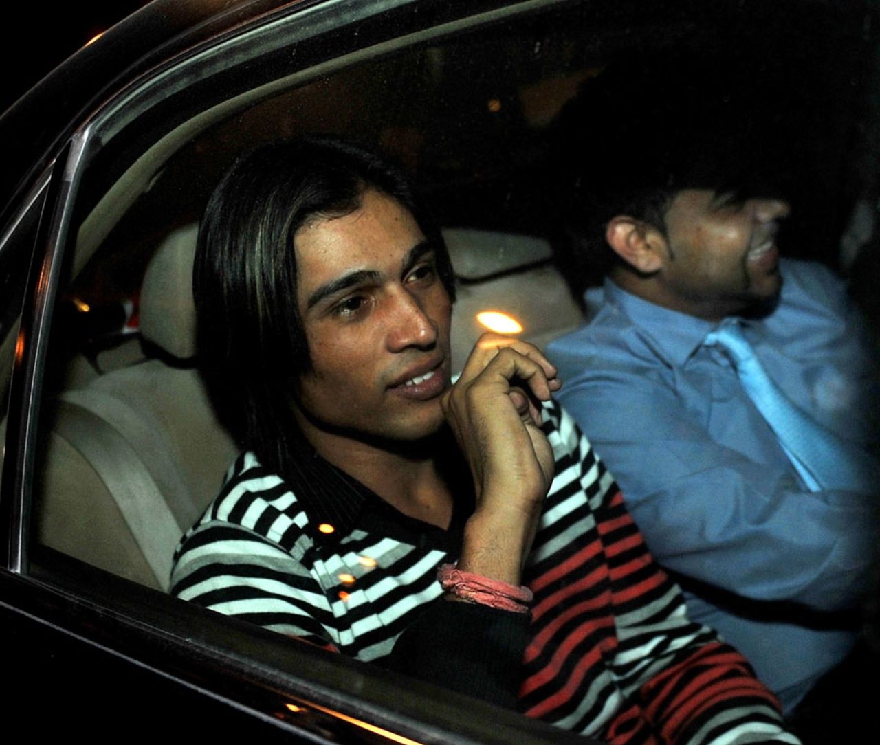 Mohammad Amir leaves after the hearing, Doha, 11 January, 20100