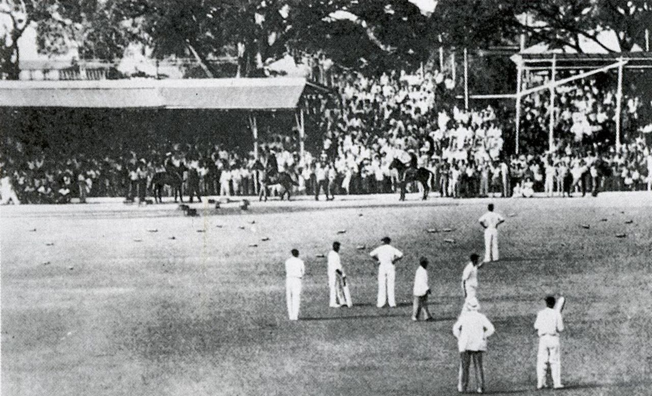 The crowd throw bottles onto the outfield after the controversial run-out of Clifford McWatt, West Indies v England, Guyana, February 26, 1954