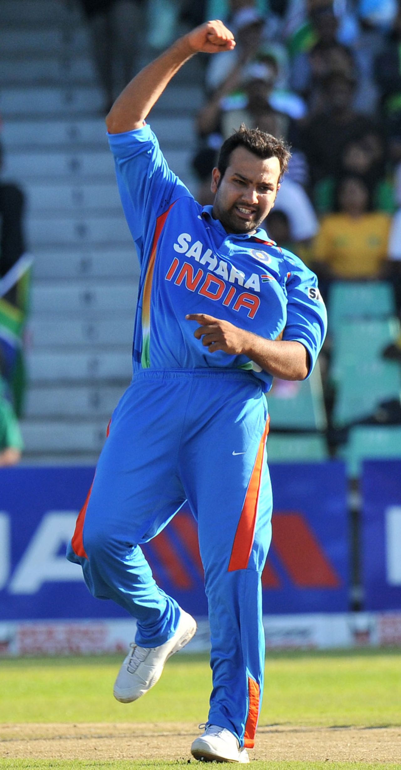 Rohit Sharma celebrates the wicket of JP Duminy, South Africa v India, 1st ODI, Durban, January 12, 2011