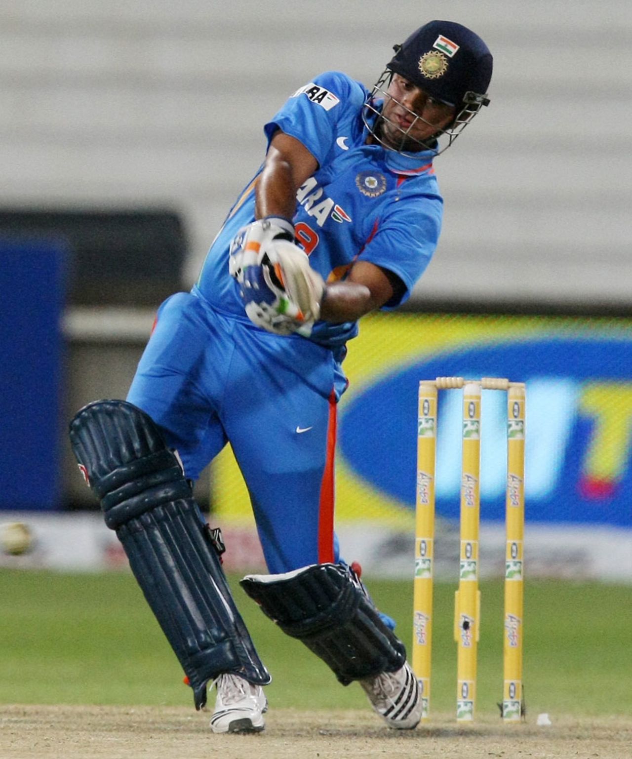 Suresh Raina attempts a big shot, South Africa v India, 1st ODI, Durban, January 12, 2011
