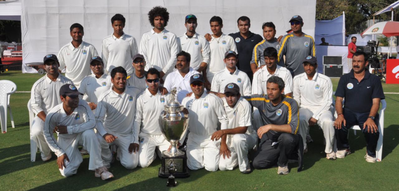 The victorious Rajasthan team poses with the Ranji trophy, Baroda v Rajasthan, Ranji Trophy final, Vadodara, January 15, 2011