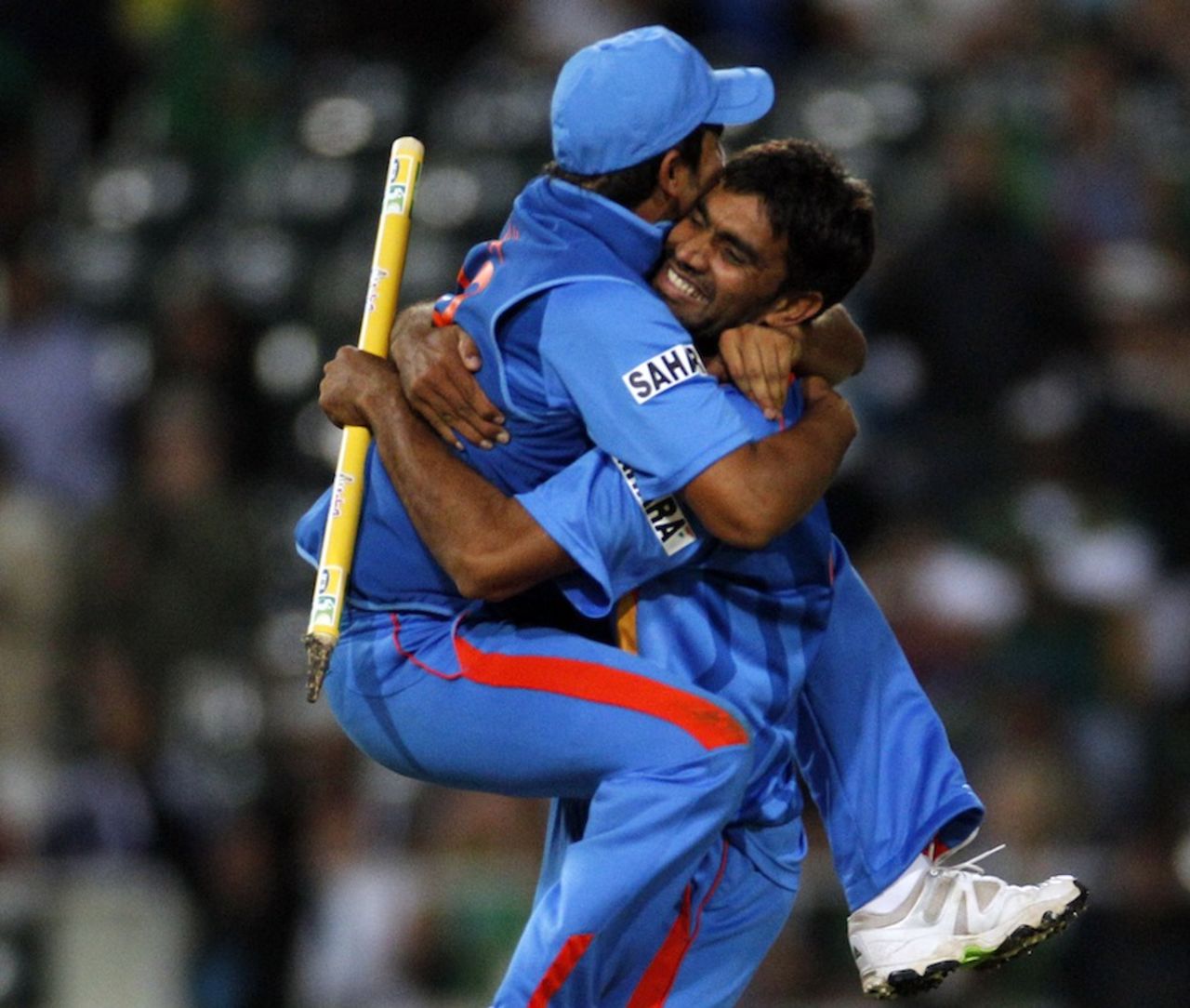 Suresh Raina leaps on to Munaf Patel after the final wicket, South Africa v India, 2nd ODI, Johannesburg, January 15, 2011