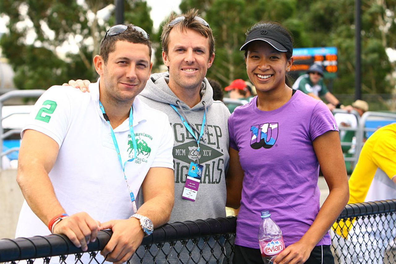 Tim Bresnan and Graeme Swann pose with British tennis player Anne Keothavong at the Australian Open, Melbourne, January 17, 2011