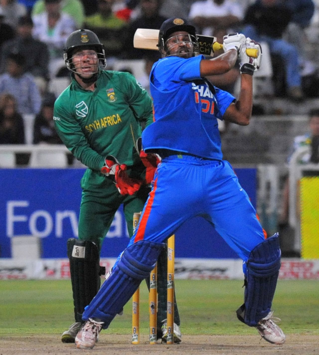 Yusuf Pathan smashes a four during his 59 off 50 balls, South Africa v India, 3rd ODI, Cape Town, January 18, 2011