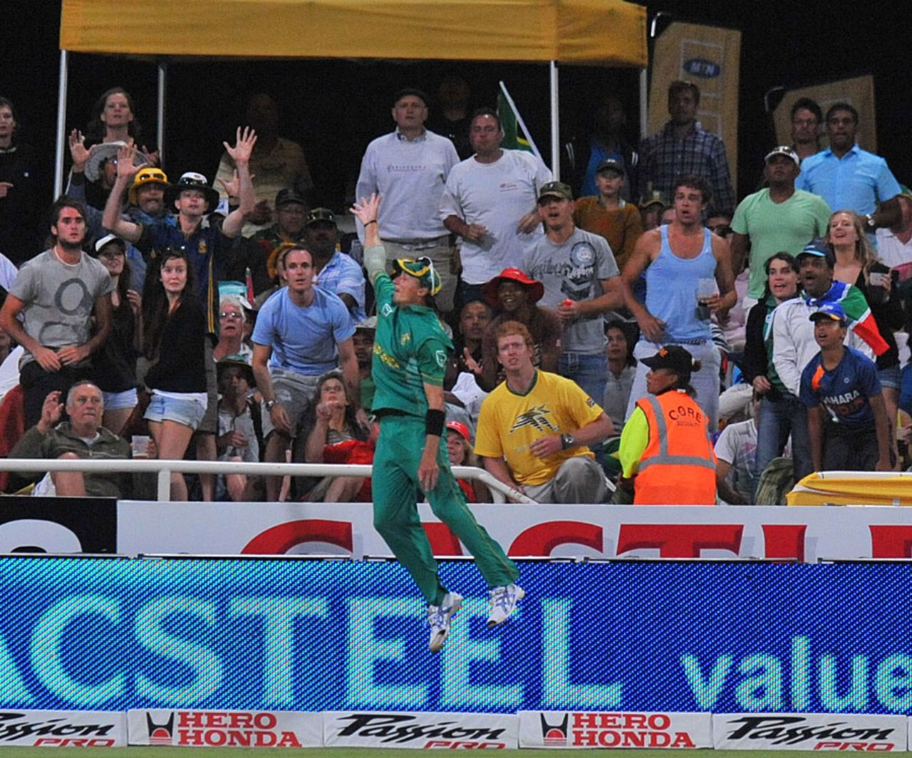 Dale Steyn jumps in vain as Yusuf Pathan's shot sails into the crowd for six, South Africa v India, 3rd ODI, Cape Town, January 18, 2011