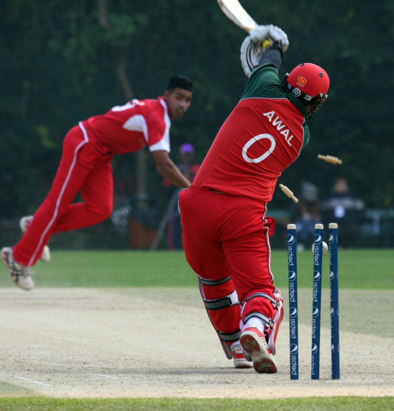 Awal Khan is clean bowled by Irfan Ahmed, Italy v Papua New Guinea, WCL Division 3, Wong Nai, January 23, 2011
