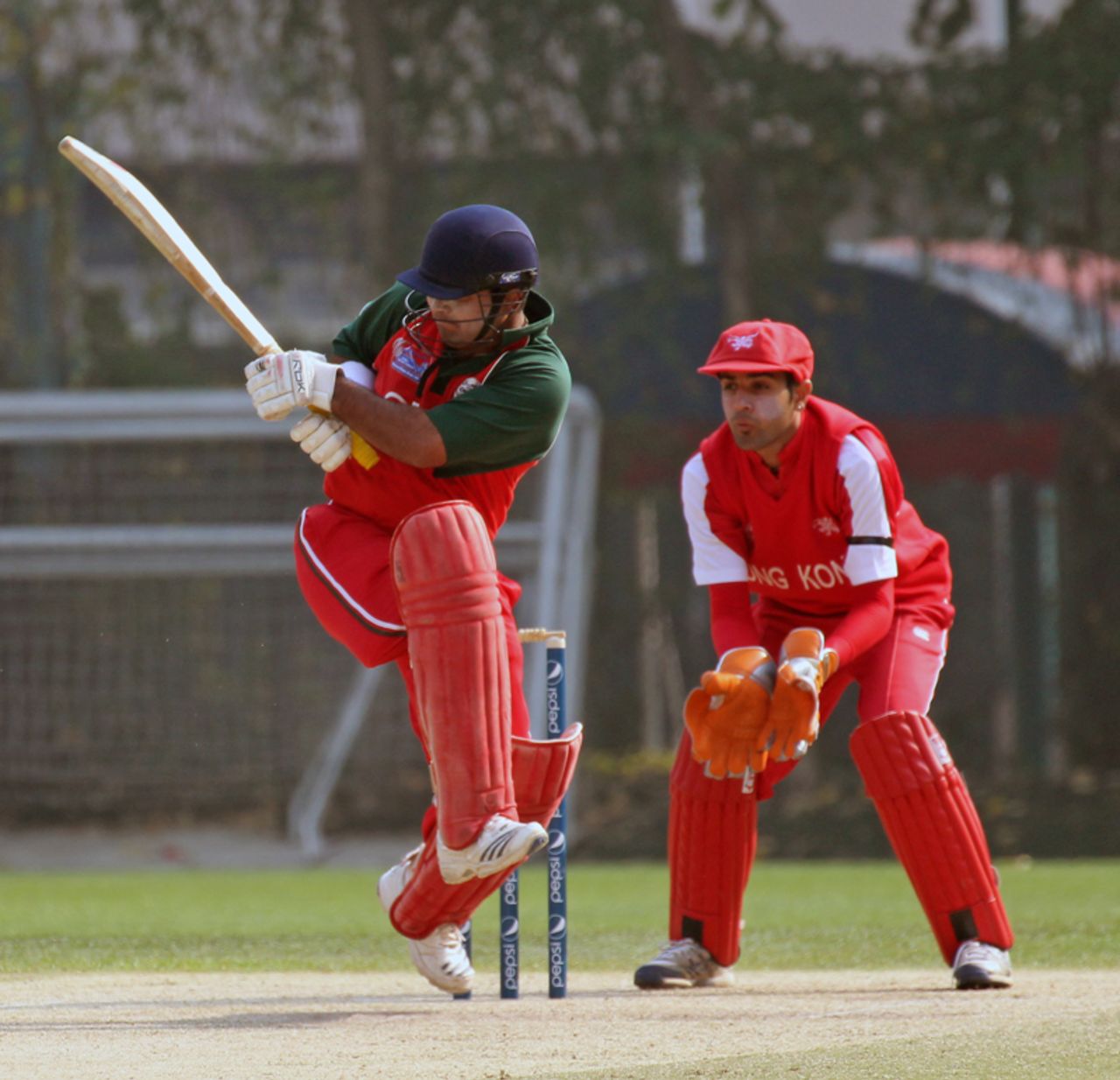 Oman's Vaibhav Wategaonkar tucks the ball towards the leg side against Hong Kong during their ICC WCL Division 3 clash at Kowloon Cricket Club on 23rd January 2011
