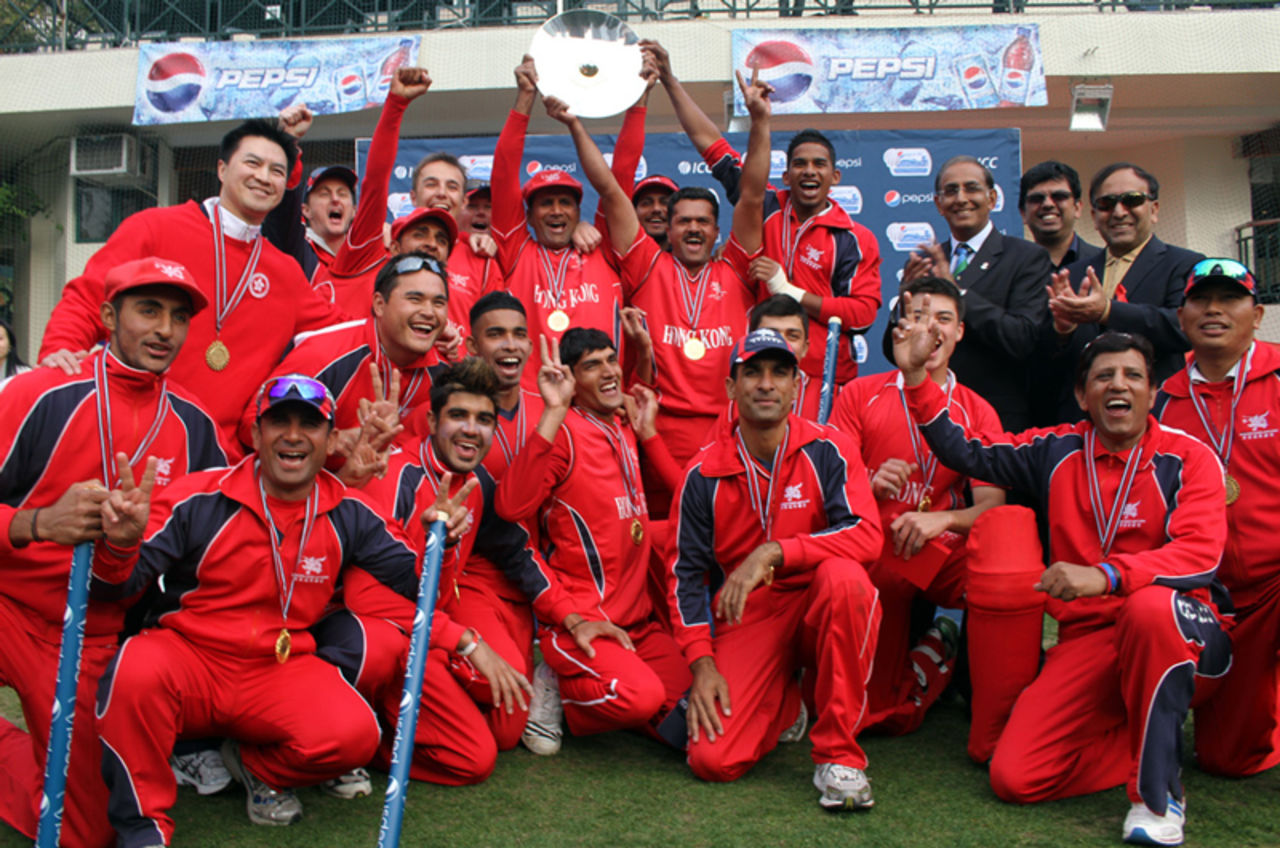 The victorious Hong Kong team pose with Haroon Lorgat (ICC Chief Executive), Captain Saleem (HKCA President) and Dinesh Tandon (HKCA Chairman) 