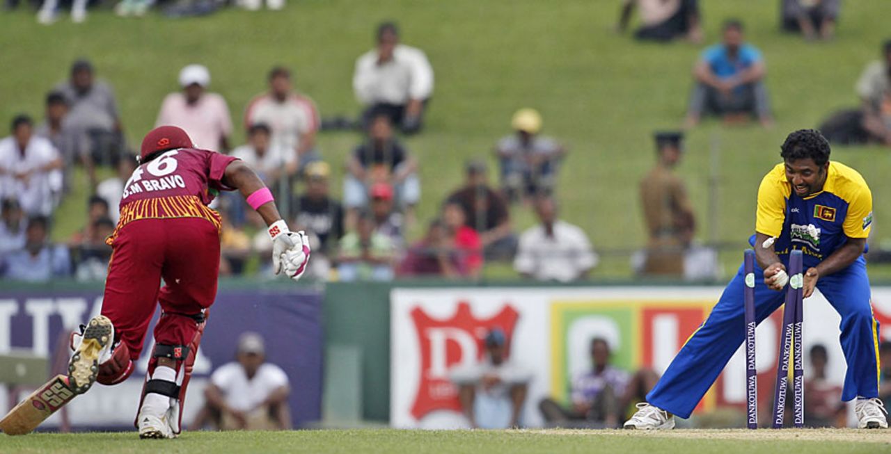 Muttiah Muralitharan runs out Darren Bravo for 8, Sri Lanka v West Indies, 1st ODI, SSC, Colombo, January 31, 2011
