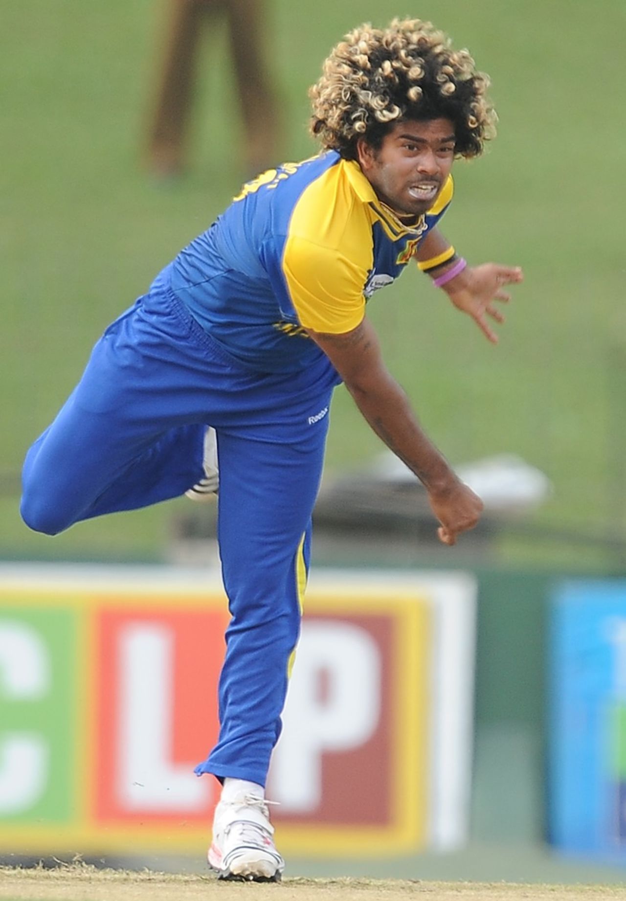 Lasith Malinga with a head full of colourful curls, Sri Lanka v West Indies, 1st ODI, SSC, Colombo, January 31, 2011