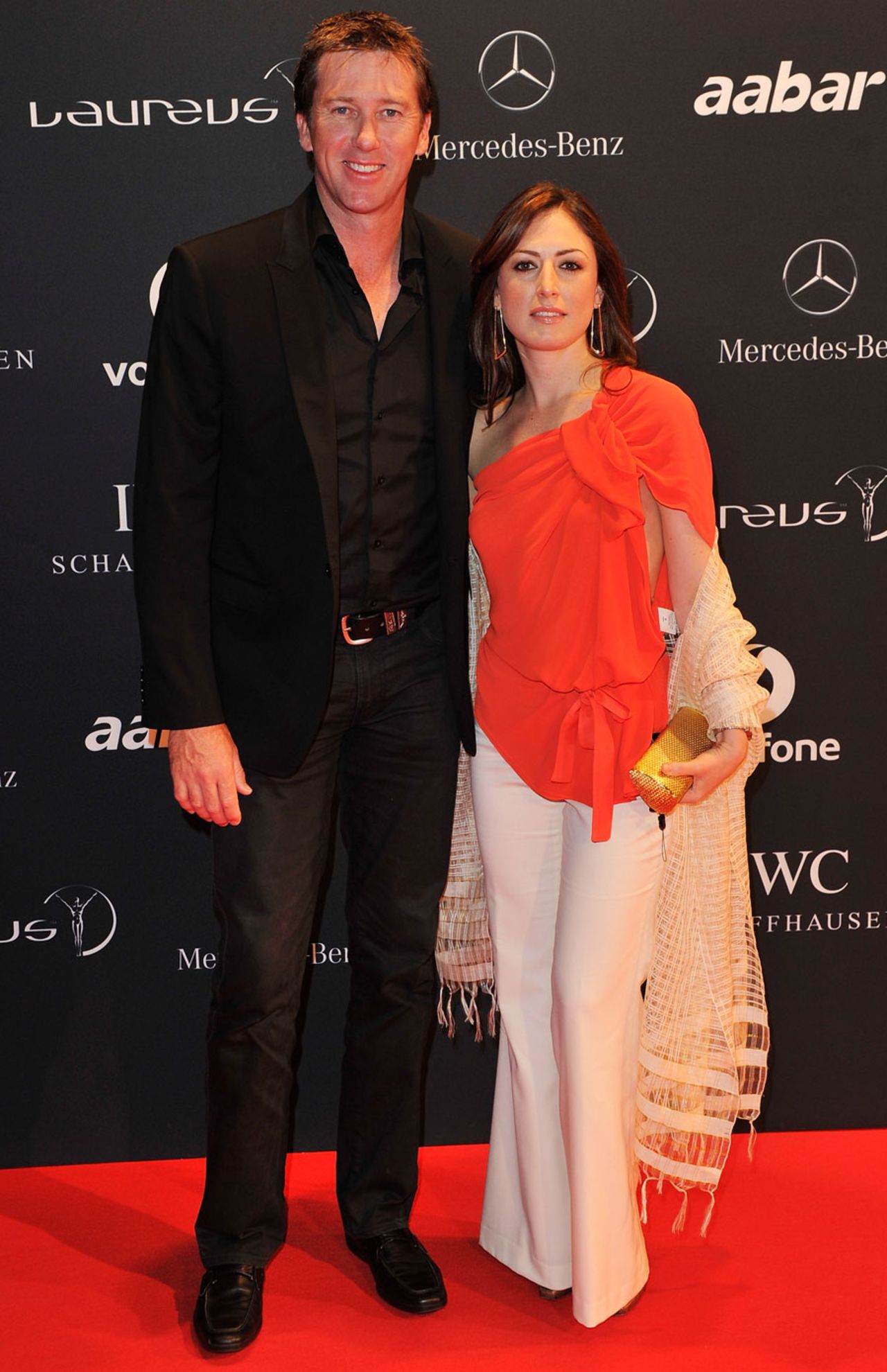 Glenn McGrath poses with his wife at the welcome party for the Laureus sports awards, Abu Dhabi, February 6, 2011