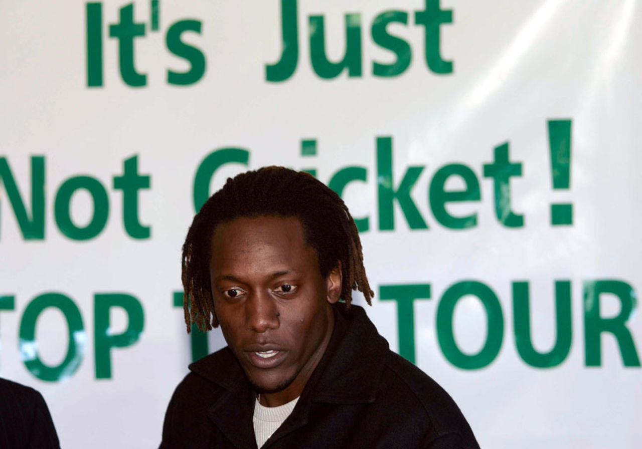 Henry Olonga speaks against New Zealand's tour of Zimbabwe at a press conference , Christchurch, July 12, 2005