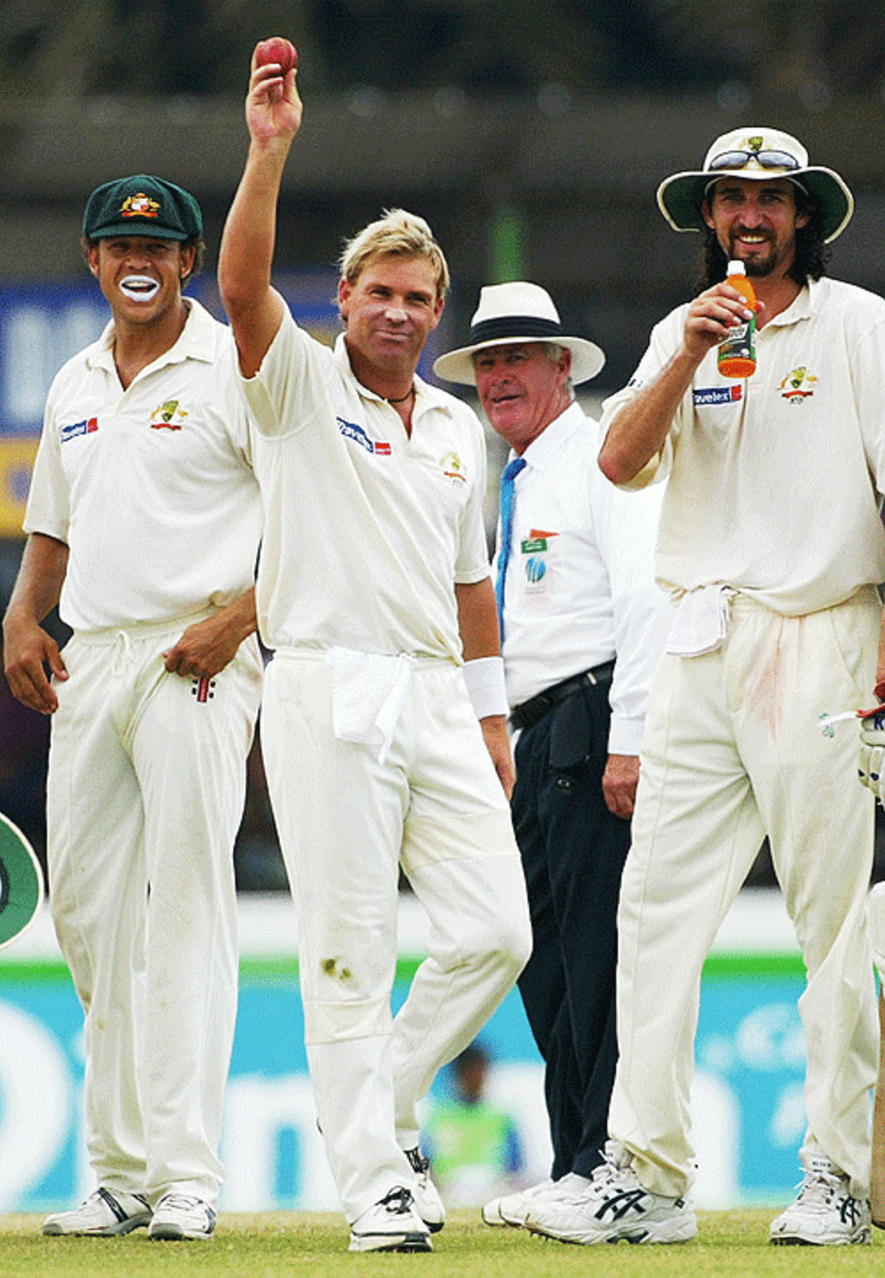 Shane Warne of Australia celebrates his 500th career wicket after dismissing Hashan Tillakaratne of Sri Lanka during day five of the First Test between Australia and Sri Lanka played at the Galle International Cricket Stadium on March 12, 2004 in Galle, Sri Lanka.