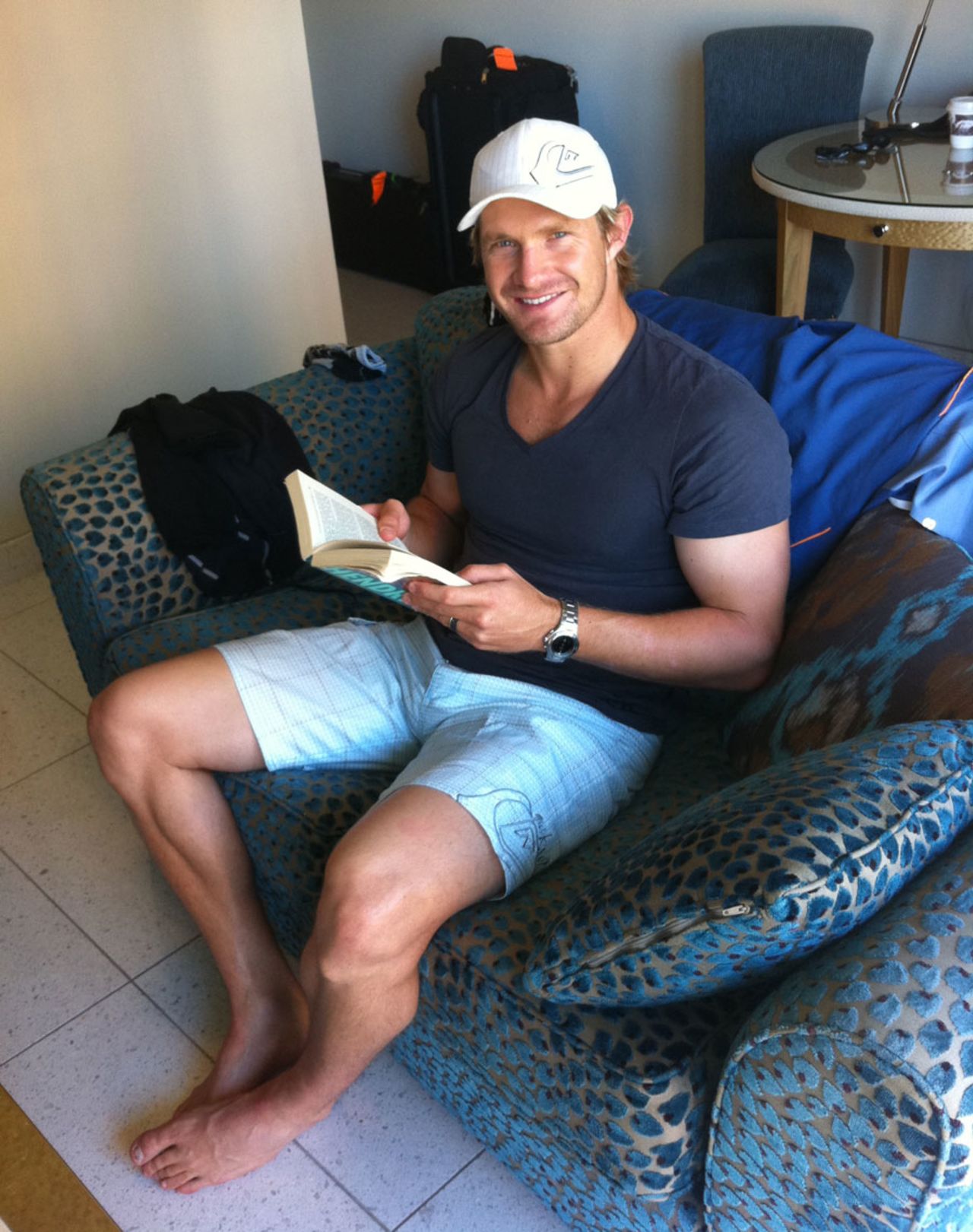 Shane Watson reading Andre Agassi's autobiography <i>Open</i>, February 8, 2011