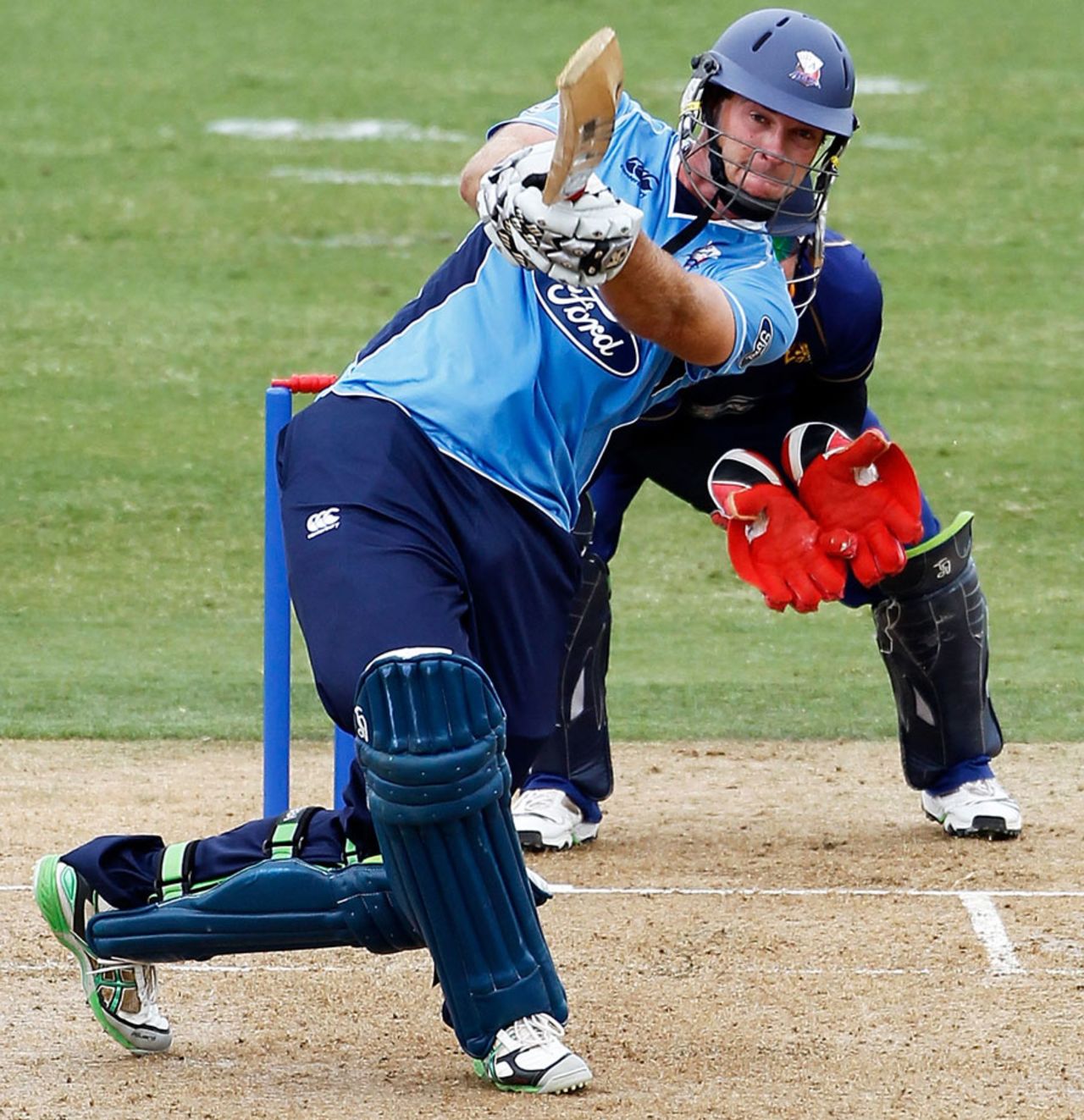 Tim McIntosh lifts one down the ground during his 161, Auckland v Otago, 3rd Preliminary Final, NZC one-day competition, Auckland, February 9, 2011