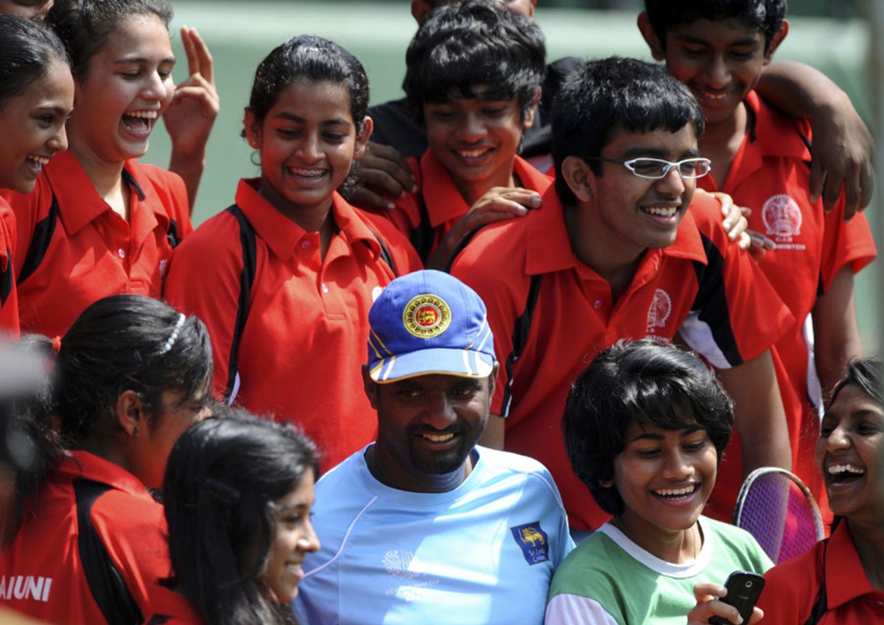 Muttiah Muralitharan interacts with young fans at the SSC, Colombo, February 11, 2011