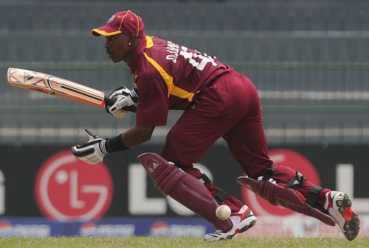 Dwayne Bravo sets off on a run during his innings of 54, Kenya v West Indies World Cup warm-up match, R Premadasa Stadium, Colombo, February 12, 2011