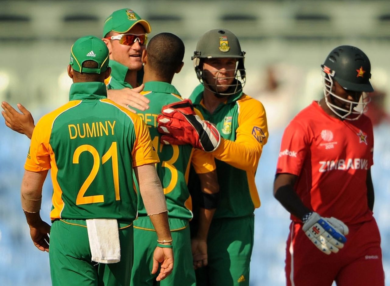 South Africa's players celebrate as Tatenda Taibu walks back, South Africa v Zimbabwe, World Cup warm-up match, Chennai, February 12, 2011