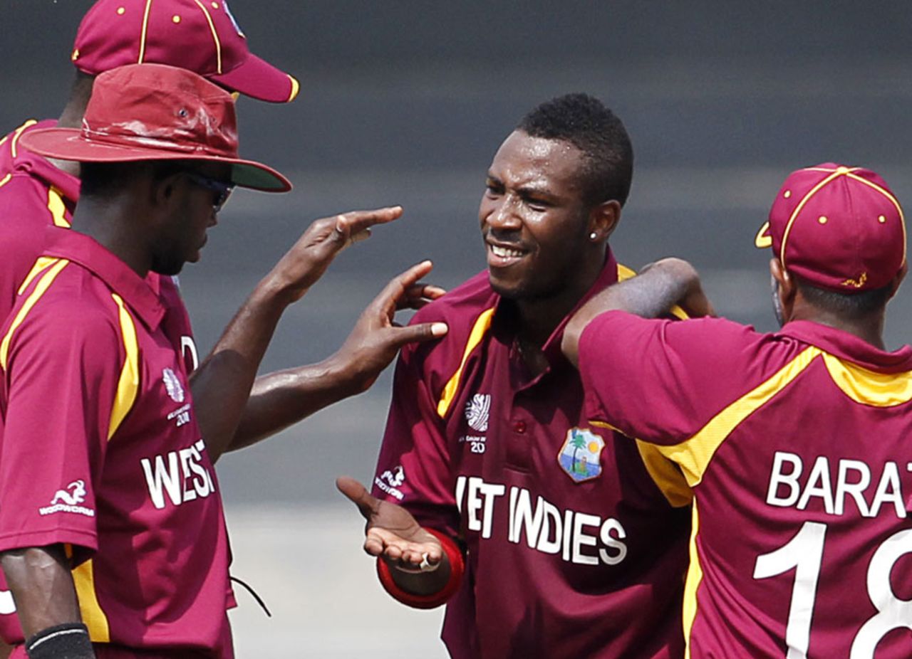 Team-mates congratulate Andre Russell on dismissing Alex Obanda, Kenya v West Indies World Cup warm-up match, R Premadasa Stadium, Colombo, February 12, 2011