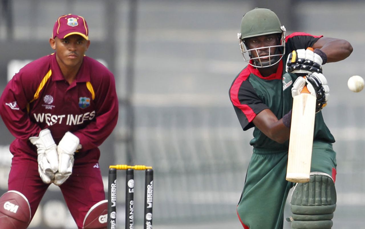 Collins Obuya hits down the ground during his innings of 68, Kenya v West Indies World Cup warm-up match, R Premadasa Stadium, Colombo, February 12, 2011