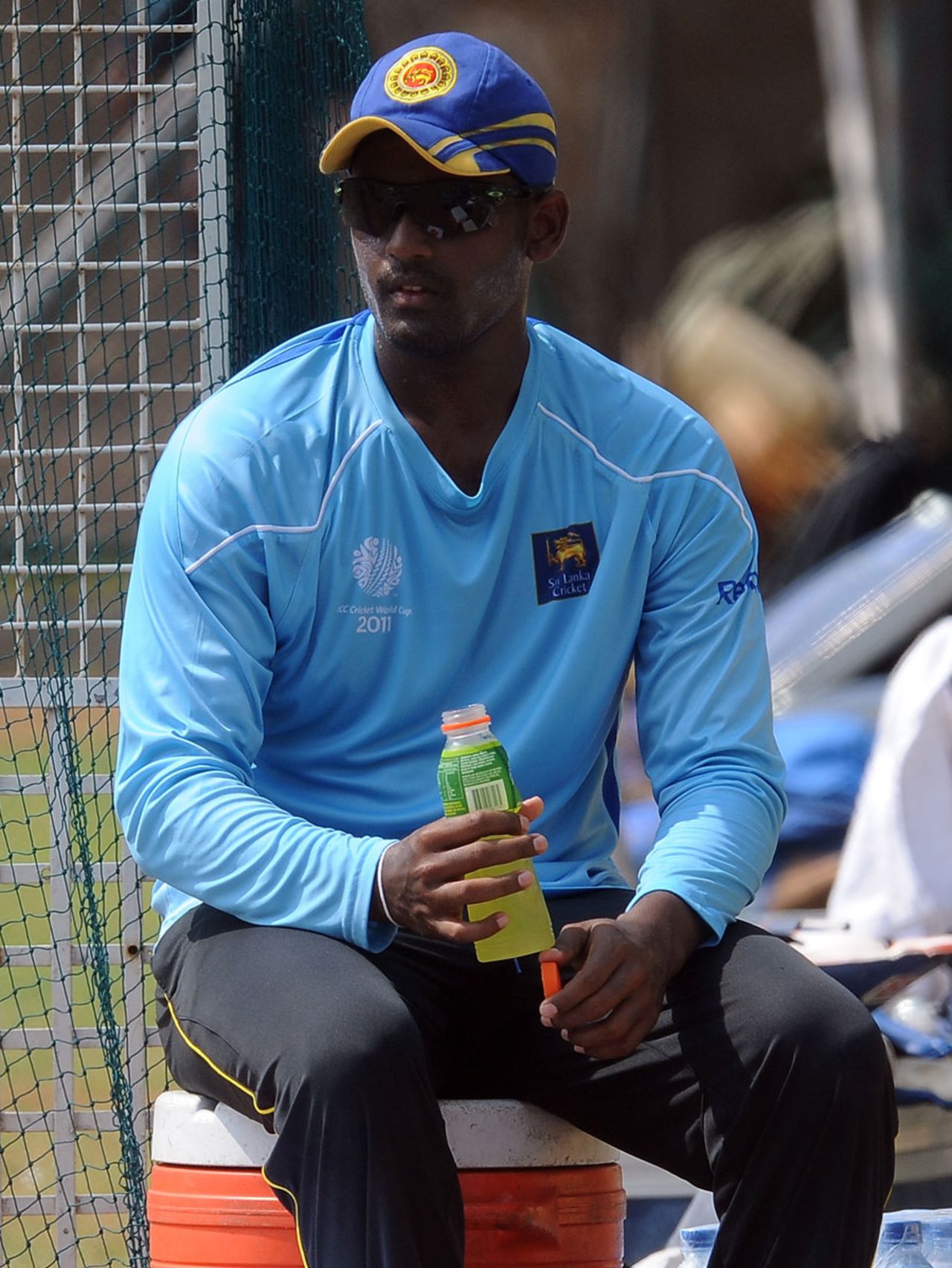 Thisara Perera takes a break during practice, R Premadasa Stadium, Colombo, February 14, 2011
