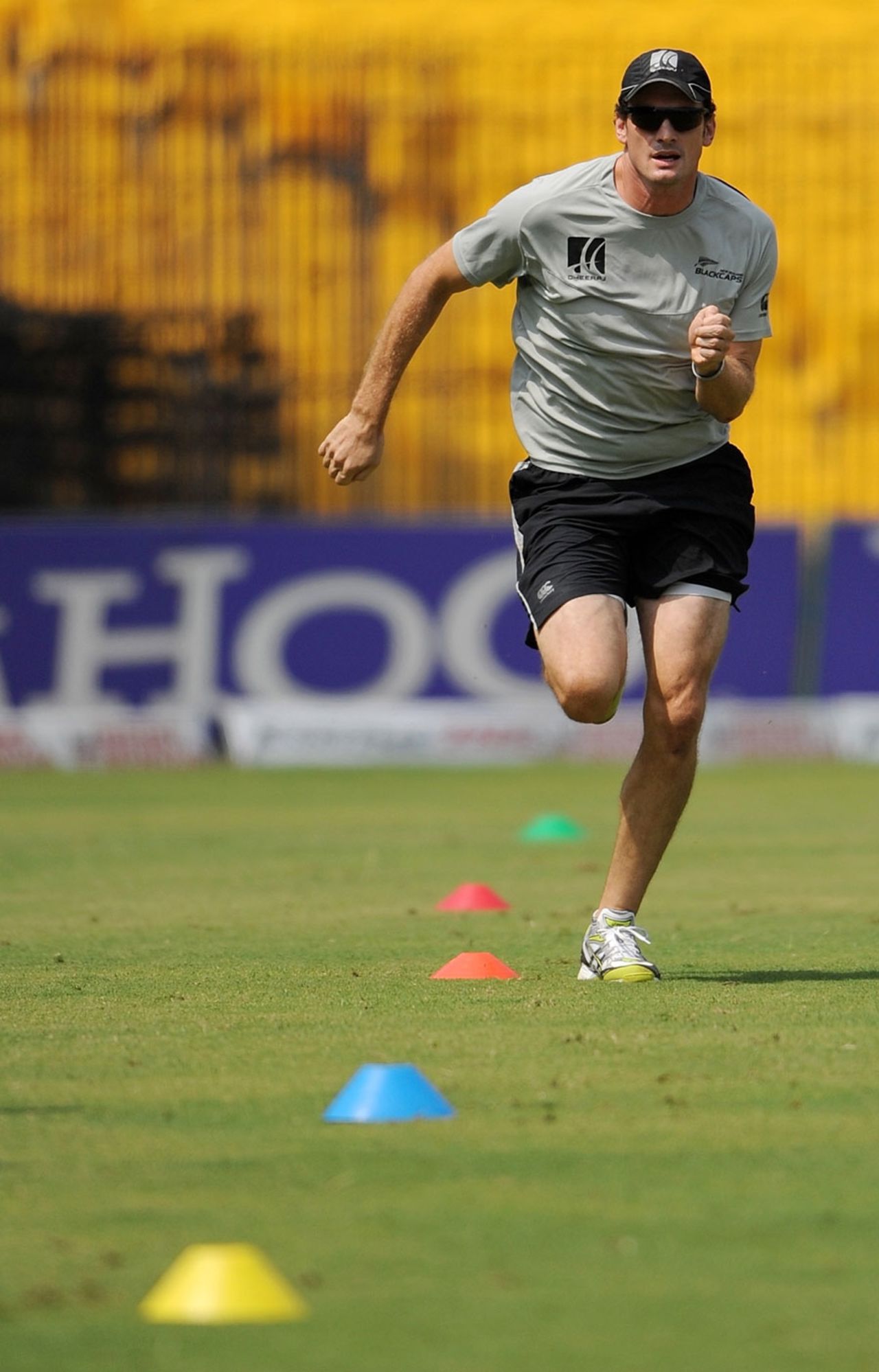 Kyle Mills warms up ahead of a training session, Chennai, February 14, 2011