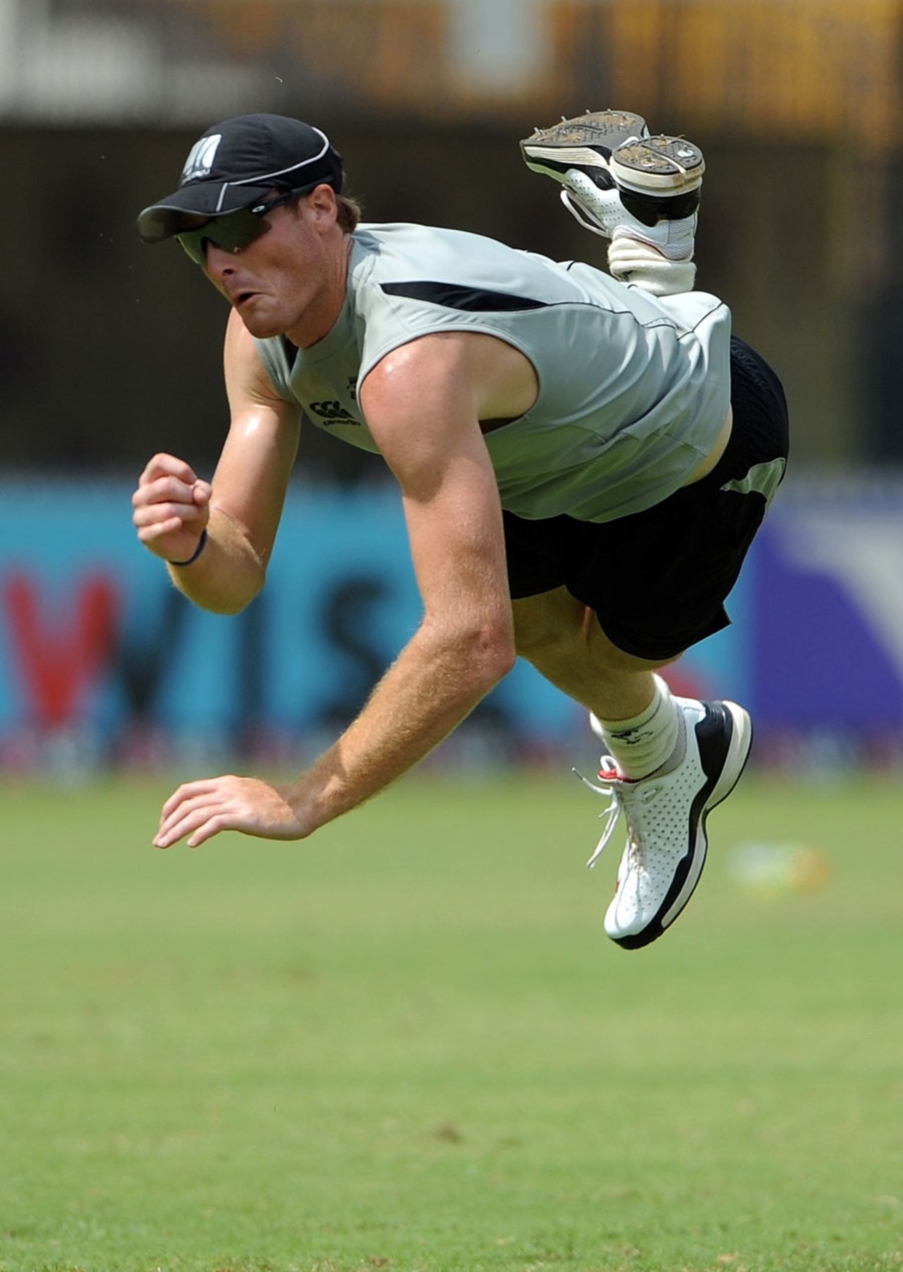 Martin Guptill dives during fielding practice, Chennai, February 14, 2011