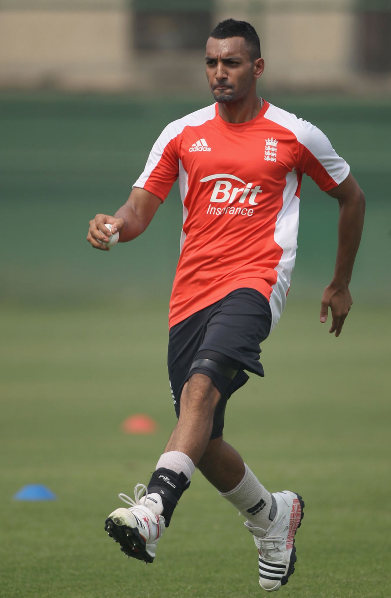 Ajmal Shahzad warms up ahead of a training session, Sher-e-Bangla, Dhaka, February 14, 2011