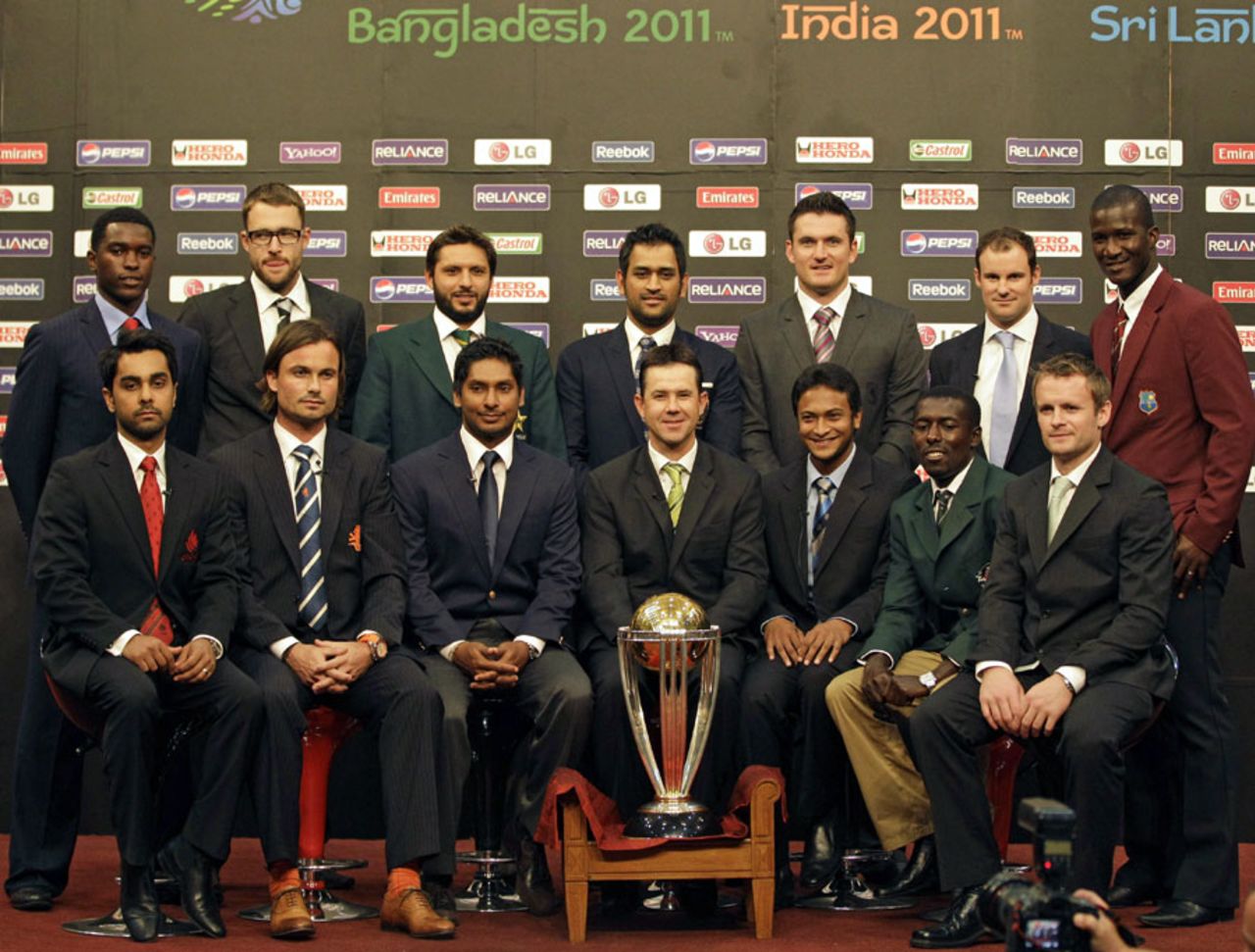 The captains of the participating nations pose with the World Cup trophy, Dhaka, February 17, 2011
