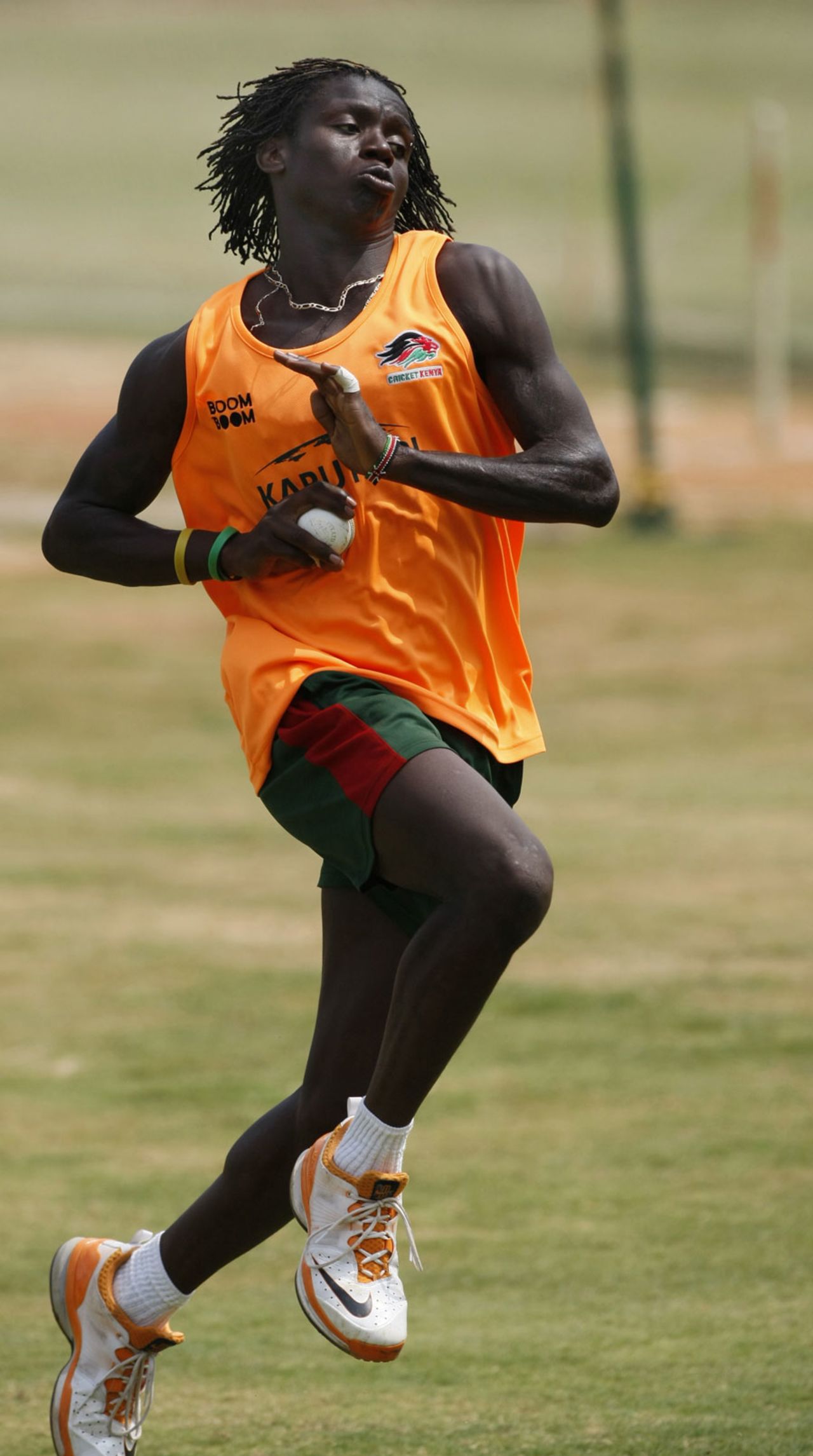 Kenya's Nehemiah Odhiambo has a bowl in the nets, Chennai, February 18, 2011