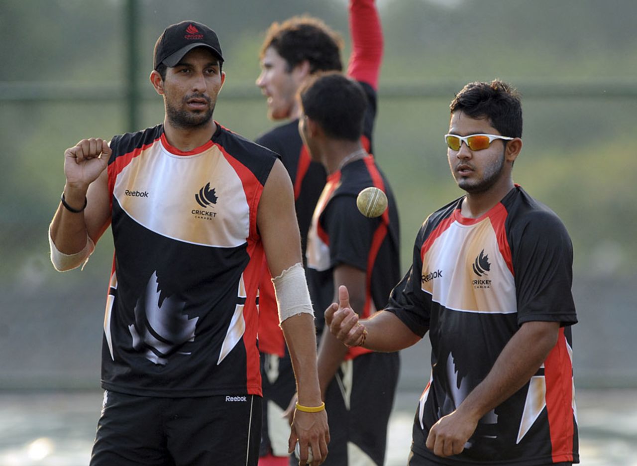 Zubin Surkari and Hiral Patel cut relaxed figures at Canada's practice session, Hambantota, February 19, 2011