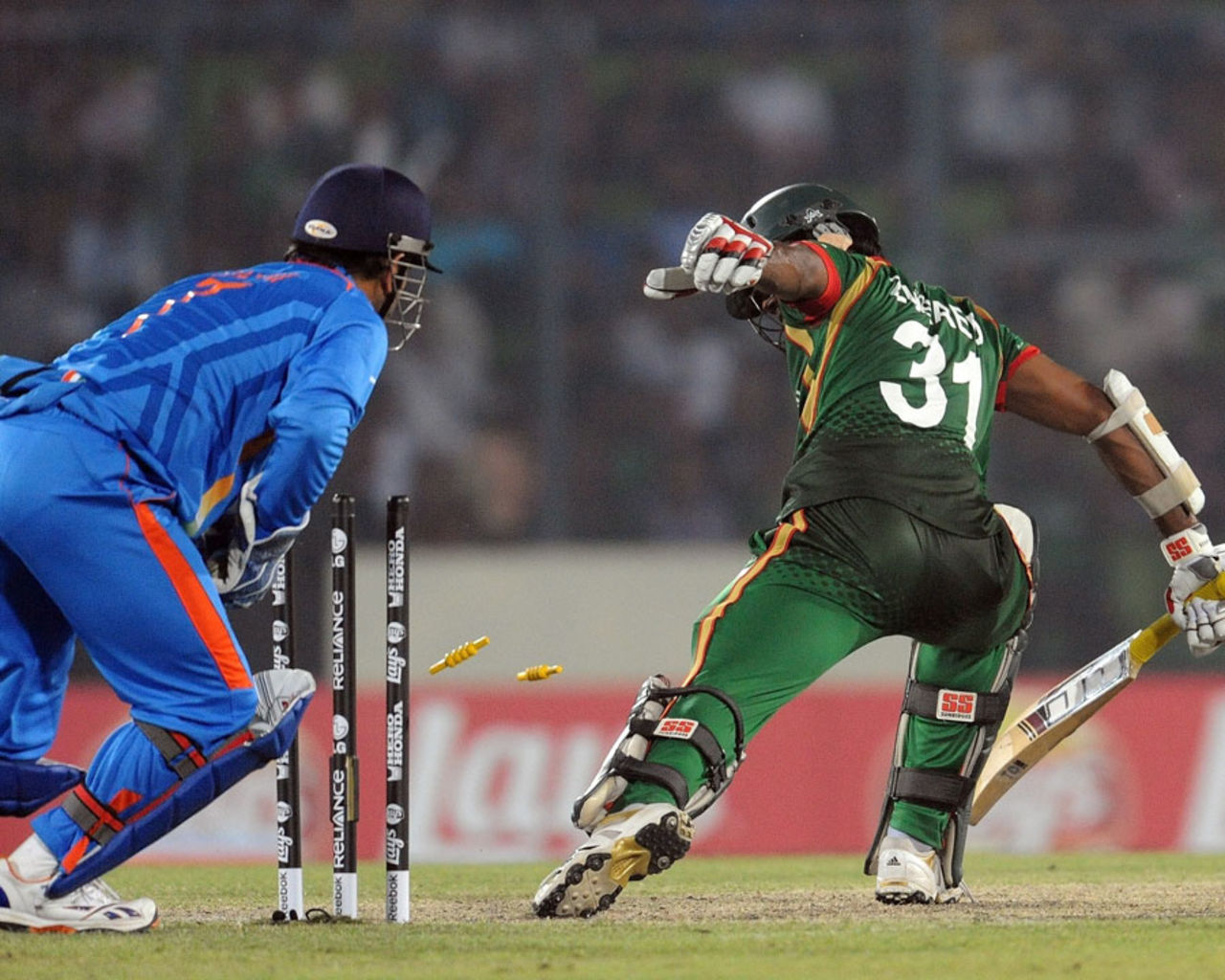 MS Dhoni stumps Junaid Siddique for 37, Bangladesh v India, Group B, World Cup 2011, Mirpur, February 19, 2011