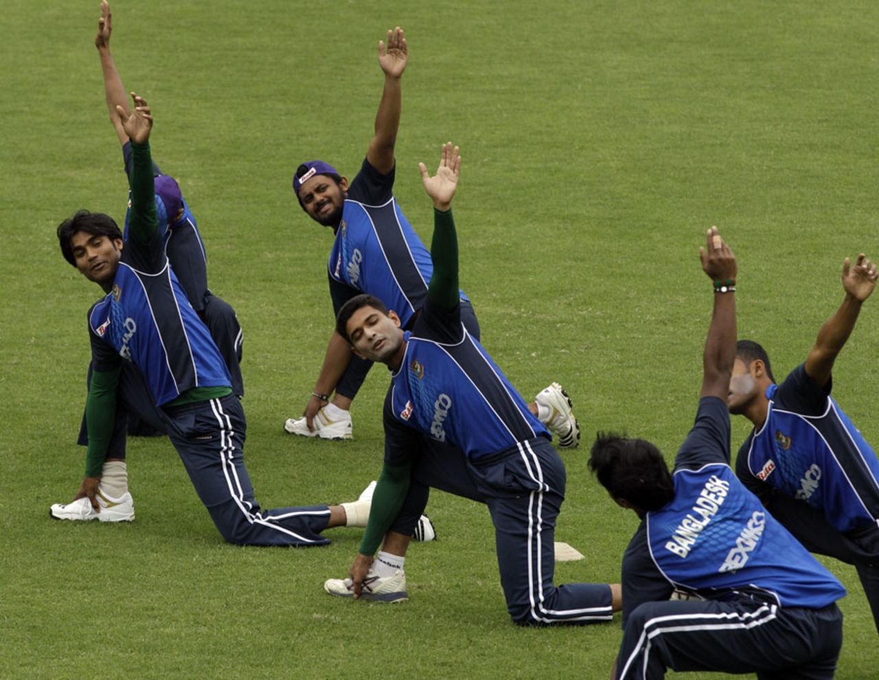 Bangladesh players stretch during a training session, Dhaka, February 21, 2011