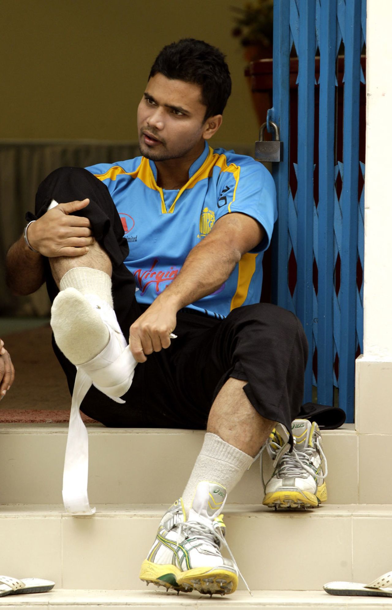 The injured Mashrafe Mortaza watches his Bangladesh team-mates train, Dhaka, February 21, 2011