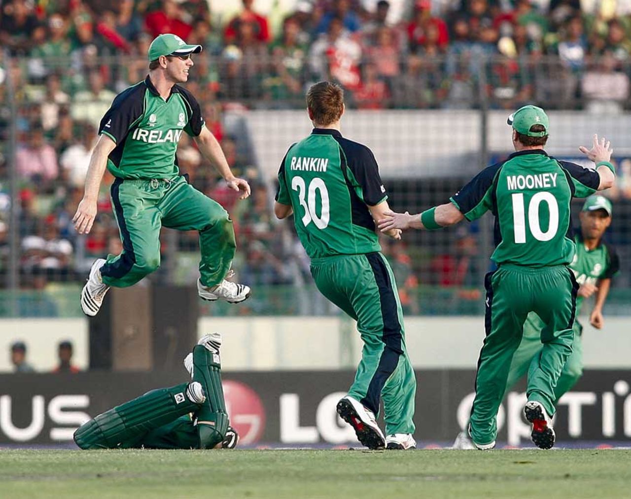 Raqibul Hasan is left sprawling on the ground after being run out by Andrew White, Bangladesh v Ireland, World Cup 2011, Mirpur, February 25, 2010
