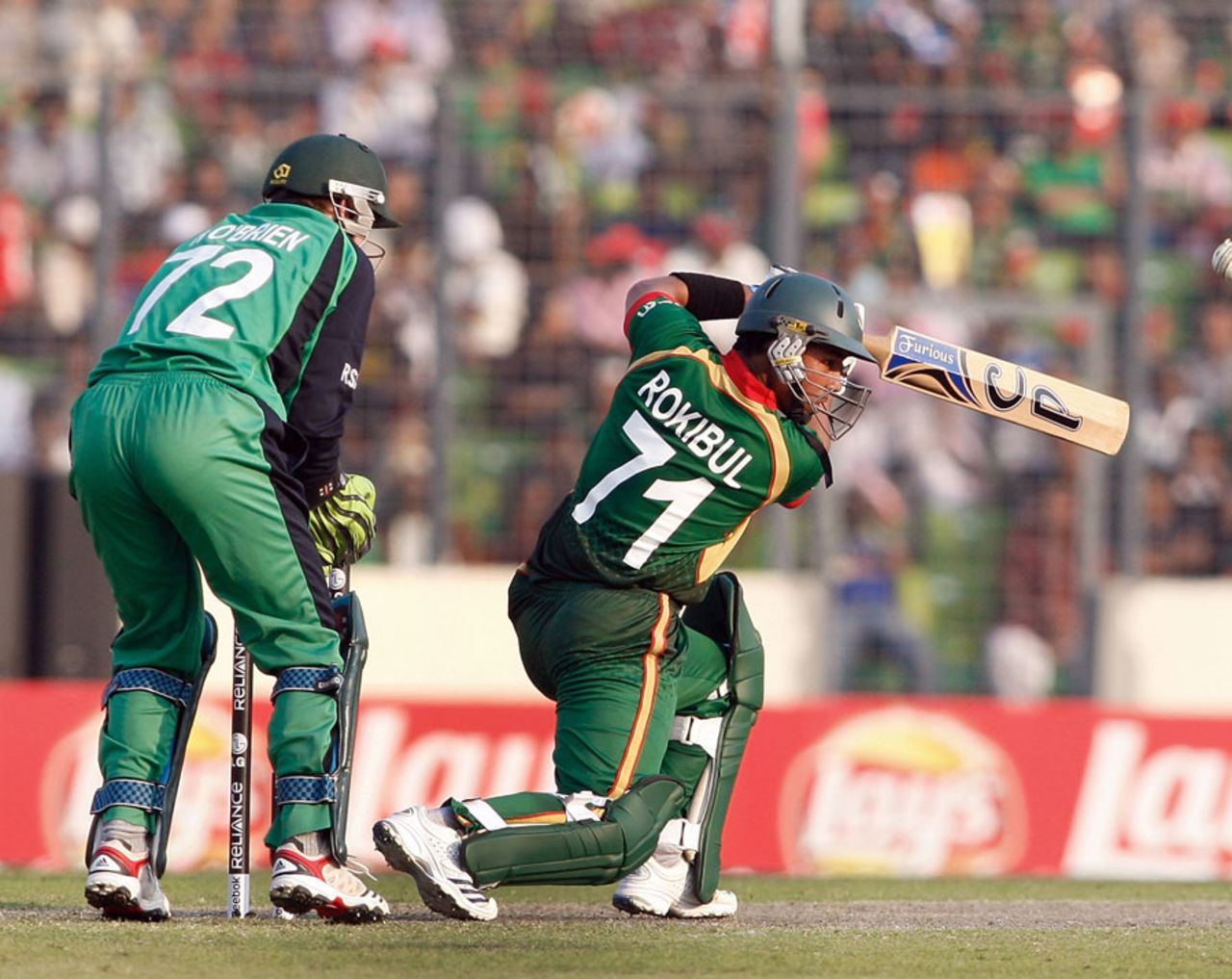 Raqibul Hasan drives through the covers during his innings of 38 , Bangladesh v Ireland, World Cup 2011, Mirpur, February 25, 2010
