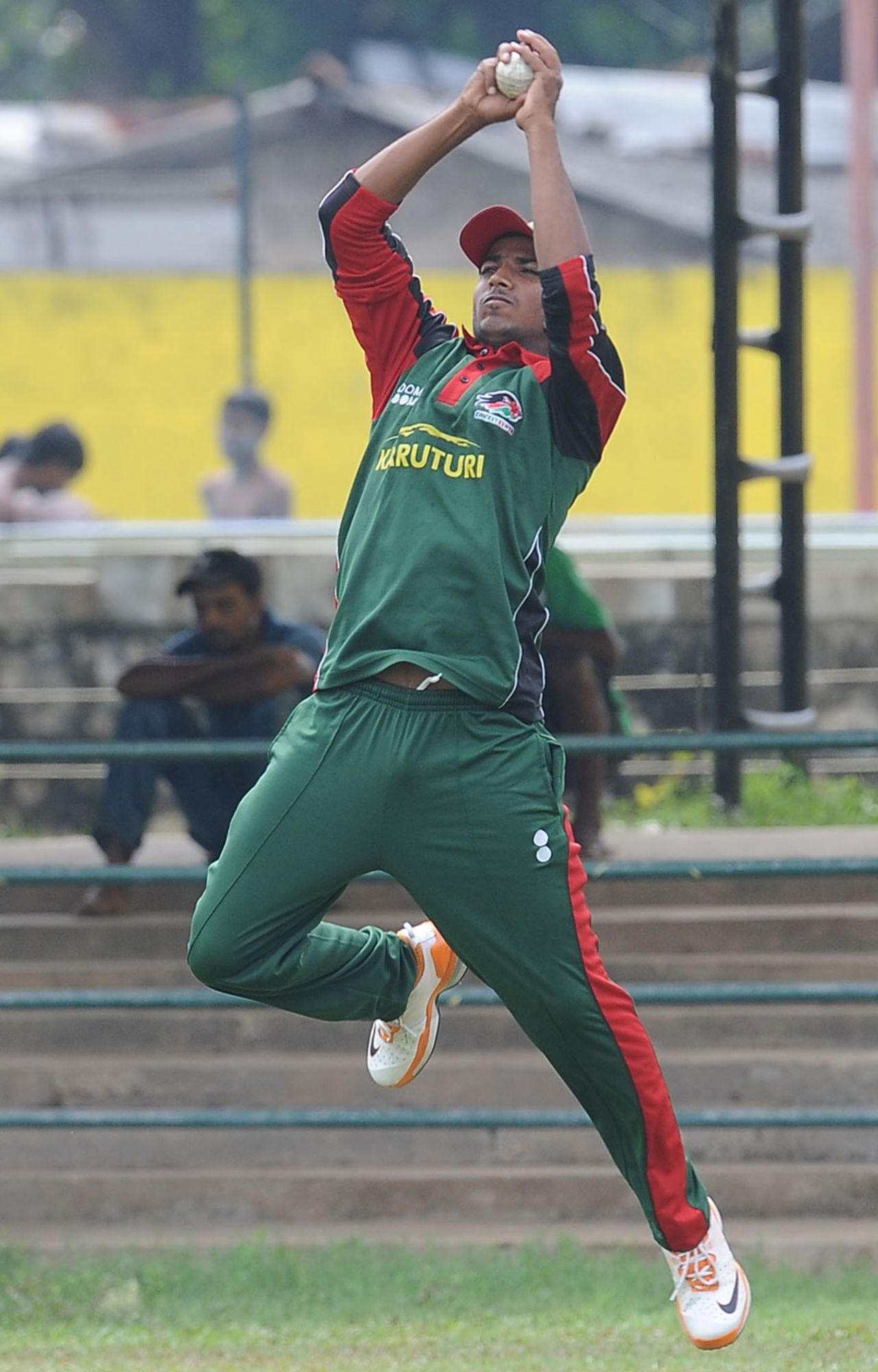 Peter Ongondo takes a catch during practice at the P Sara Oval, Colombo, February 26, 2011