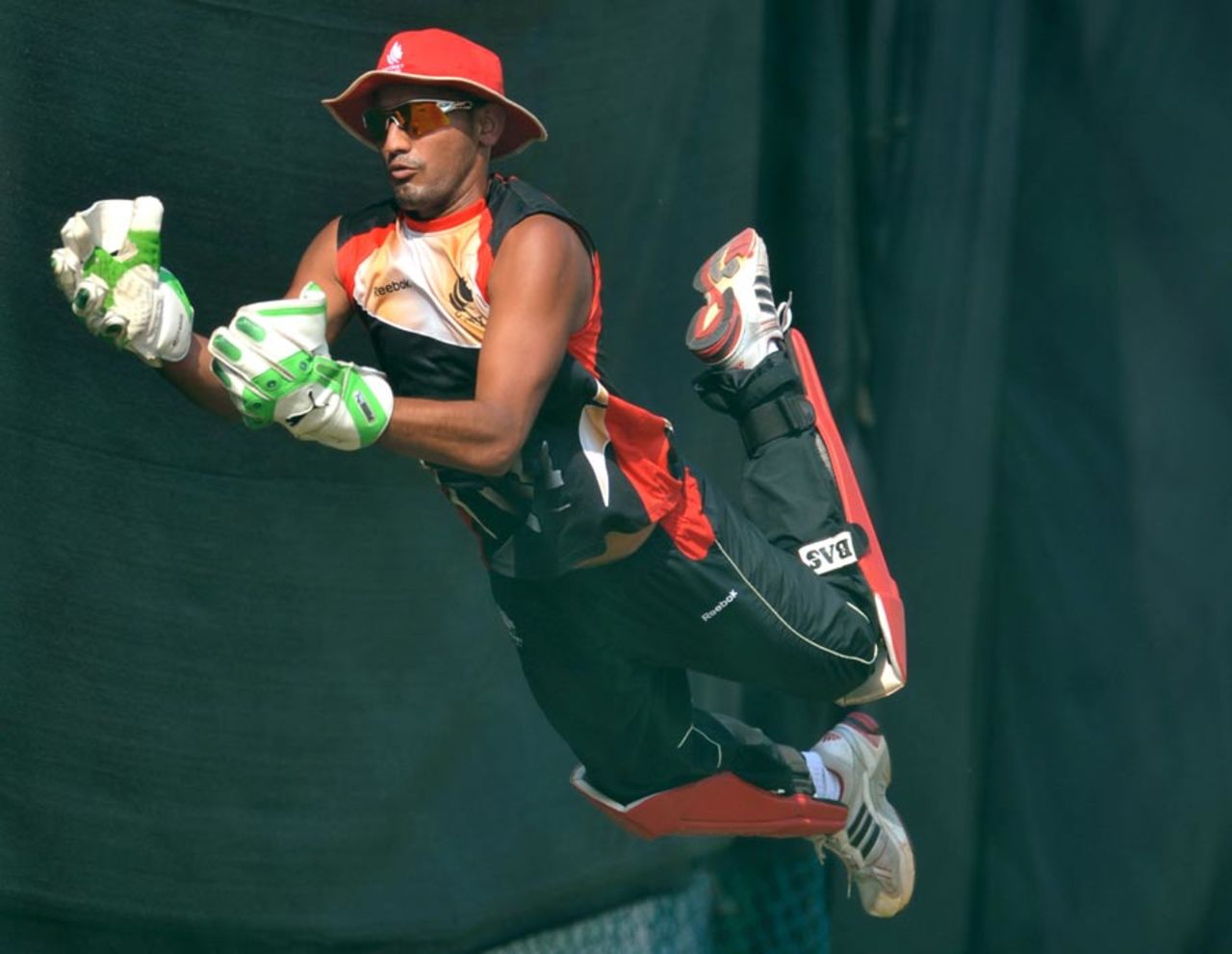 Canada player Hamza Tariq  dives to take a catch during training, Nagpur, ICC World Cup, February 27, 2011