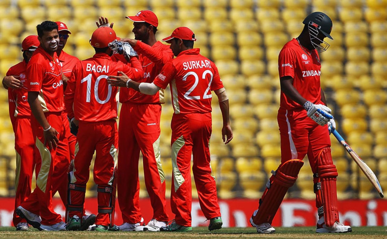 Elton Chigumbura is disconsolate after being dismissed for 5 while Canada celebrate, Canada v Zimbabwe, World Cup, Group A, Nagpur, February 28, 2011