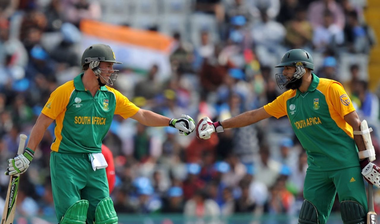 AB de Villiers and Hashim Amla knock gloves after putting up a record third-wicket partnership in Mohali, Netherlands v South Africa, World Cup 2011, Mohali, March 3, 2011