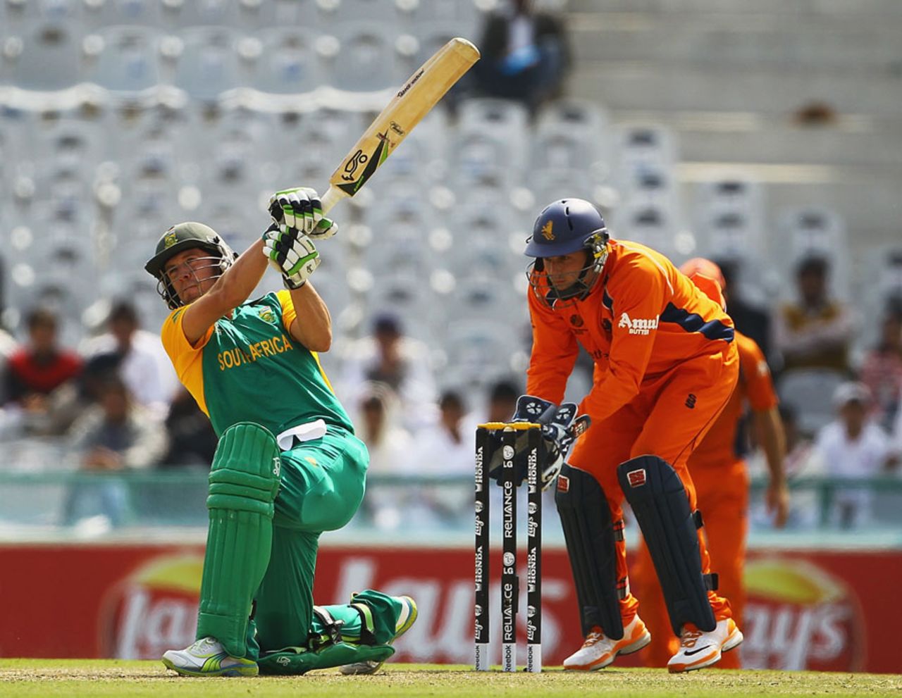 AB de Villiers lifts the ball for a six during his century off 88 balls, Netherlands v South Africa, World Cup 2011, Mohali, March 3, 2011