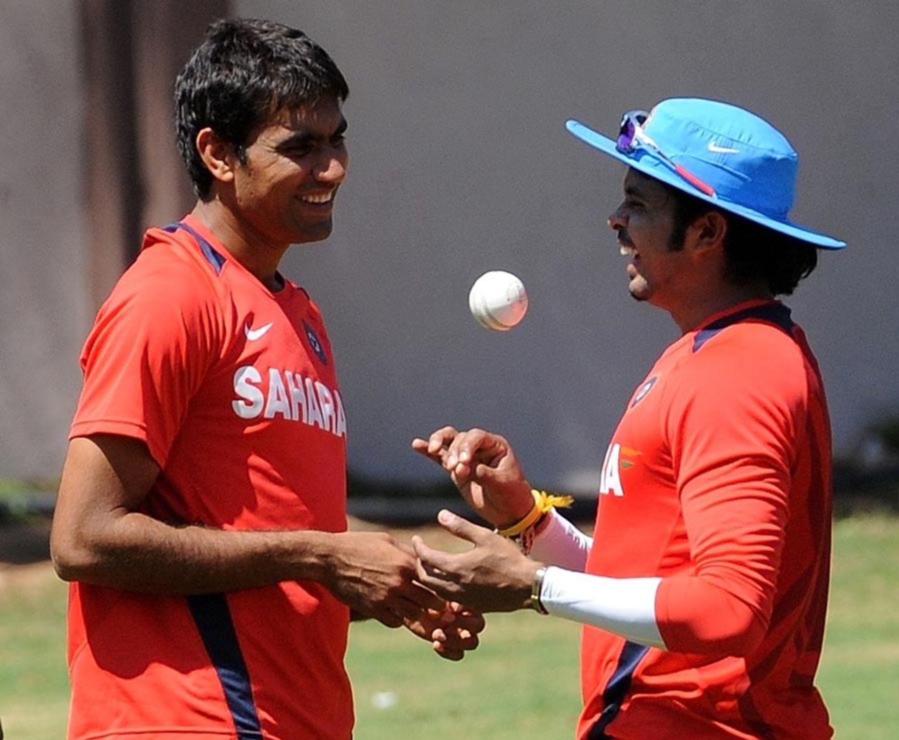 Munaf Patel and Sreesanth share a joke during a training session, Bangalore, March 3, 2011