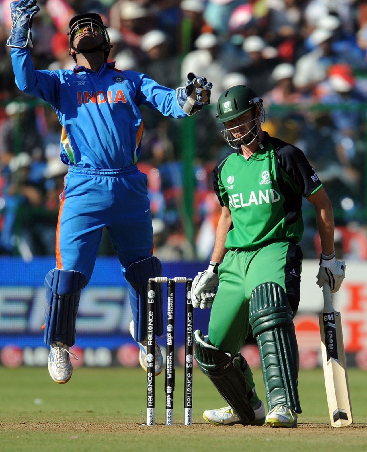 MS Dhoni is delighted after catching Andrew White off Yuvraj Singh, India v Ireland, Group B, World Cup 2011, Bangalore, March 6, 2011