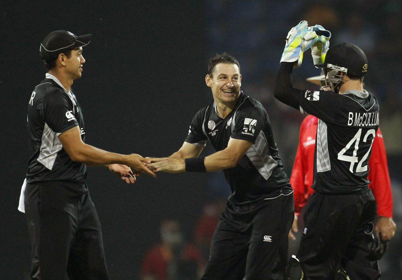 Nathan McCullum is congratulated on dismissing Umar Akmal, New Zealand v Pakistan, Group A, World Cup, Pallekele, March 8, 2011