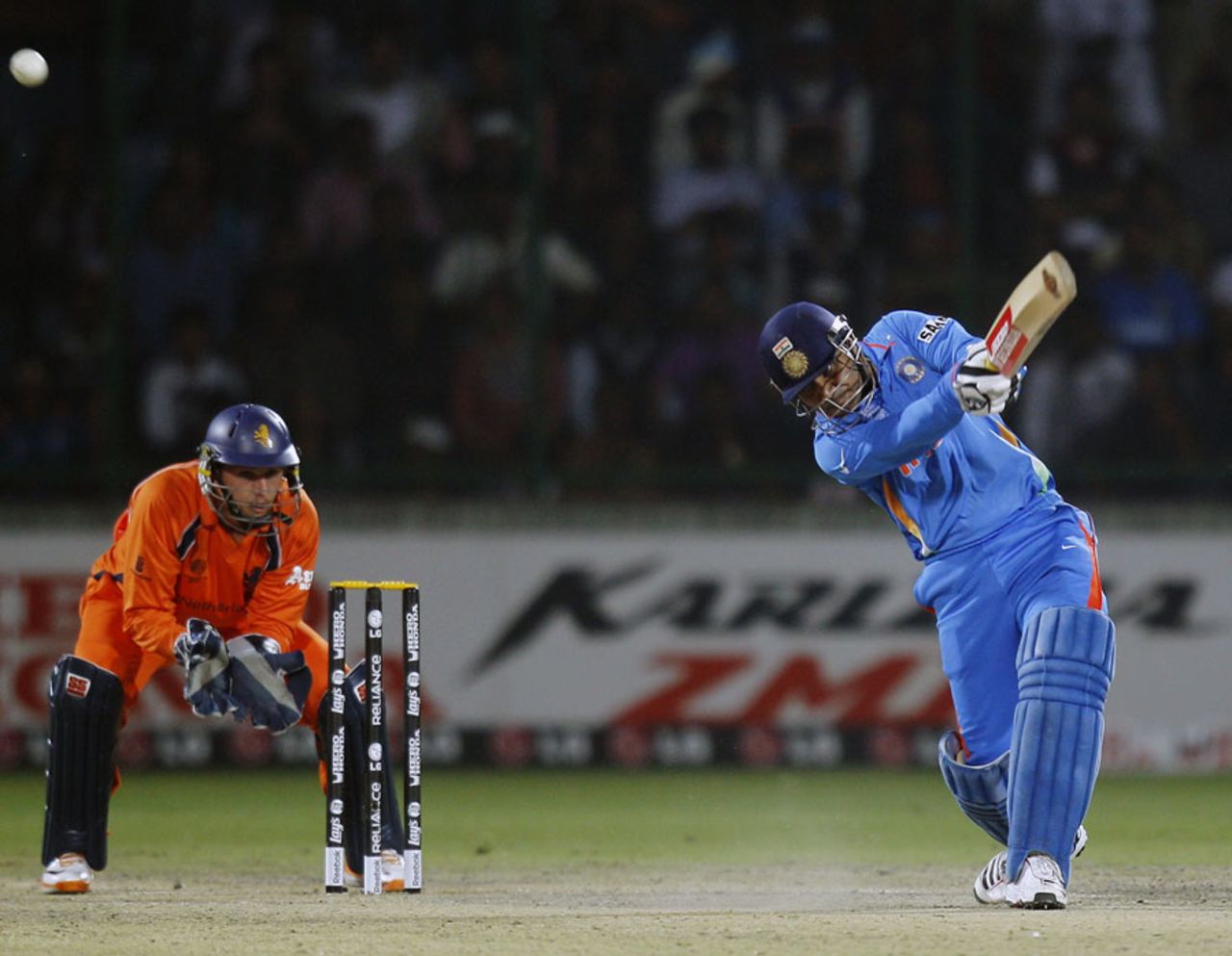 Virender Sehwag hits one over extra cover, India v Netherlands, Group B, World Cup, Delhi, March 9, 2011