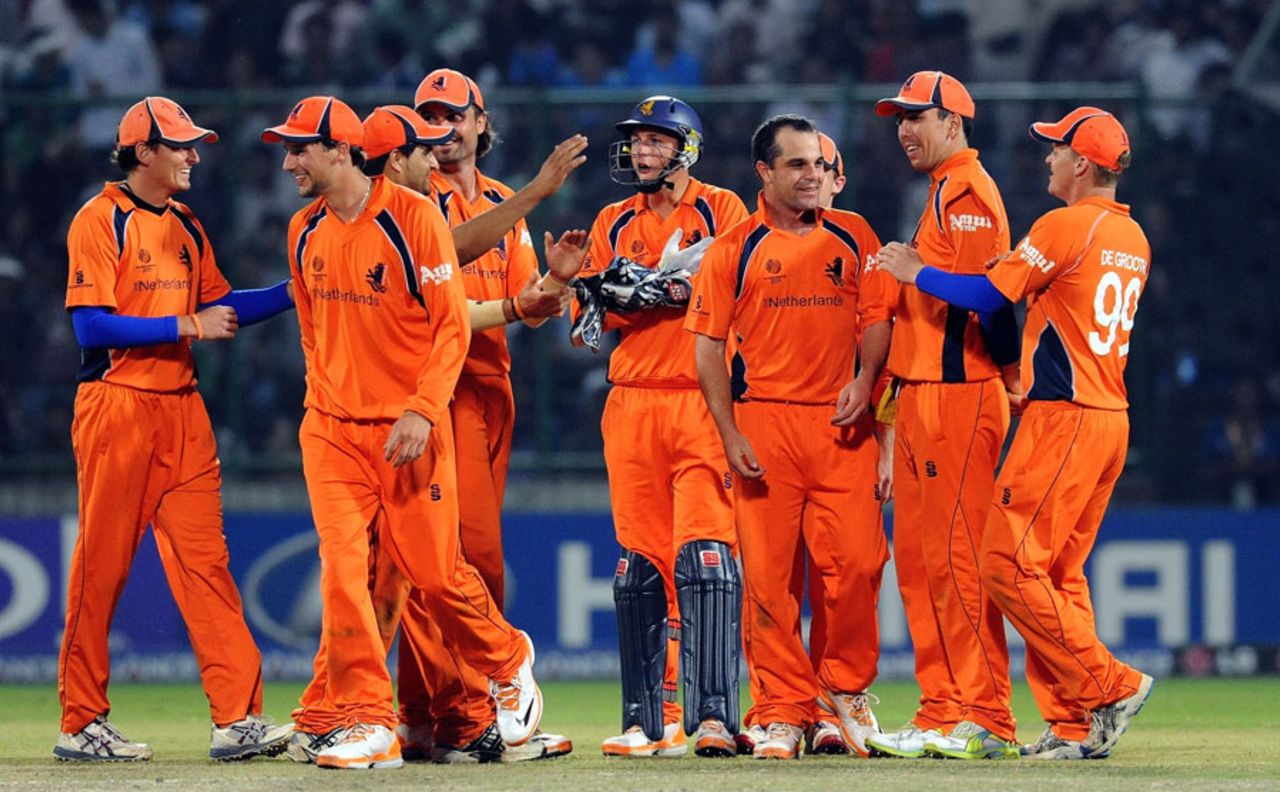 Netherlands celebrate the wicket of Virat Kohli, India v Netherlands, Group B, World Cup, Delhi, March 9, 2011