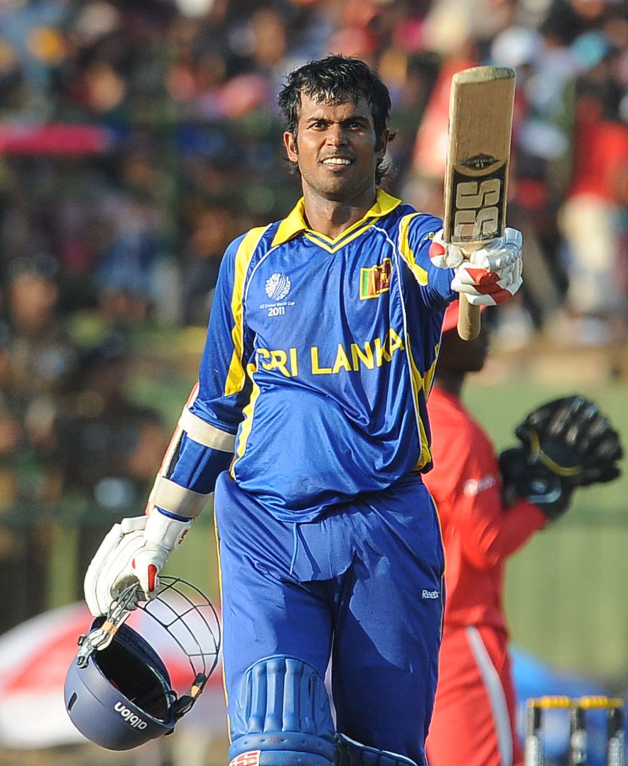 Upul Tharanga acknowledges the cheers after getting to a hundred, Sri Lanka v Zimbabwe, Group A, World Cup, Pallekele, March 10, 2011