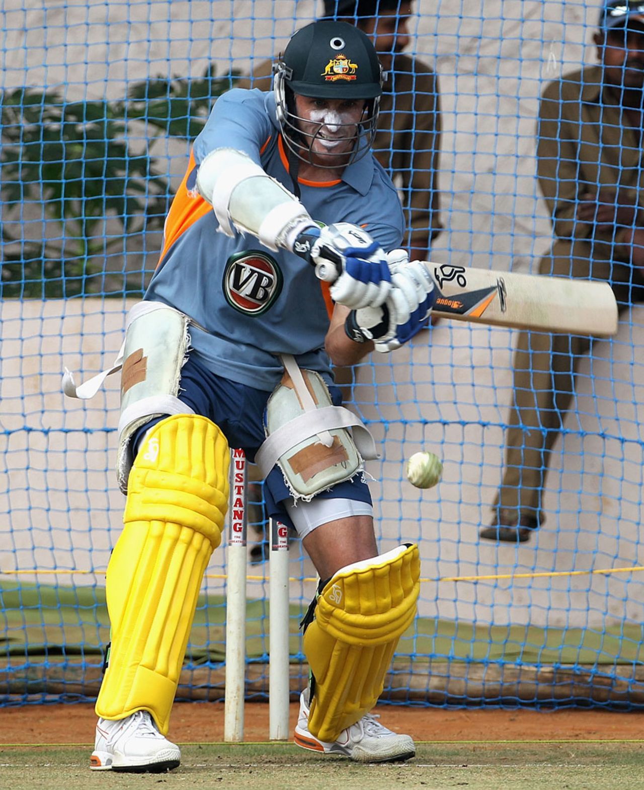 Michael Hussey has a bat in the nets, Bangalore, March 9, 2011